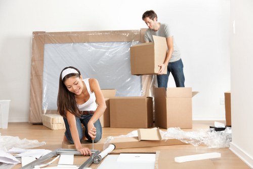 Moving boxes and packing supplies arranged for a home move in Lewisham