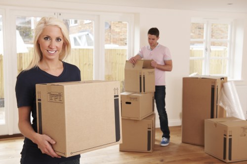 Family home belongings being loaded during house removals in Lewisham