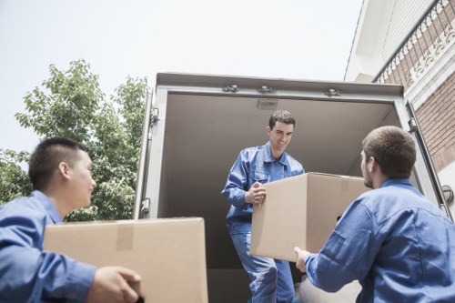 Packed boxes and furniture in a Lewisham removal van