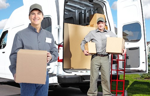 Team reviewing health and safety practices for a removal service