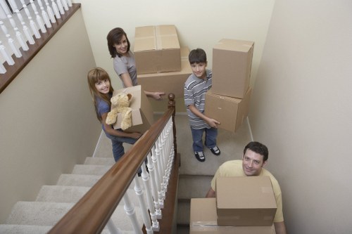 A professional team organizing household items during a Lewisham move